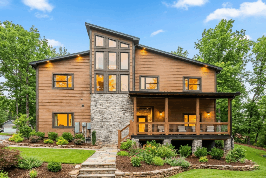 Modern contemporary mountain home in East Tennessee custom-built by MCHB. Featuring a two-story structure plus basement, luxury balconies, and amenities in the Smoky Mountains.