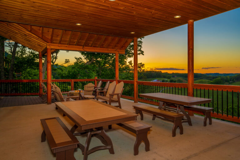 Handcrafted wooden balcony of a Gatlinburg cabin oriented to capture panoramic Smoky Mountain views while maintaining privacy.